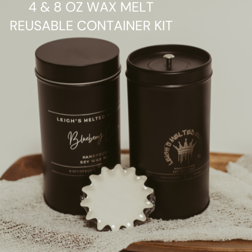 4oz and 8oz wax melt reusable container kit in black tins with a fluted wax liner on a wooden tray.