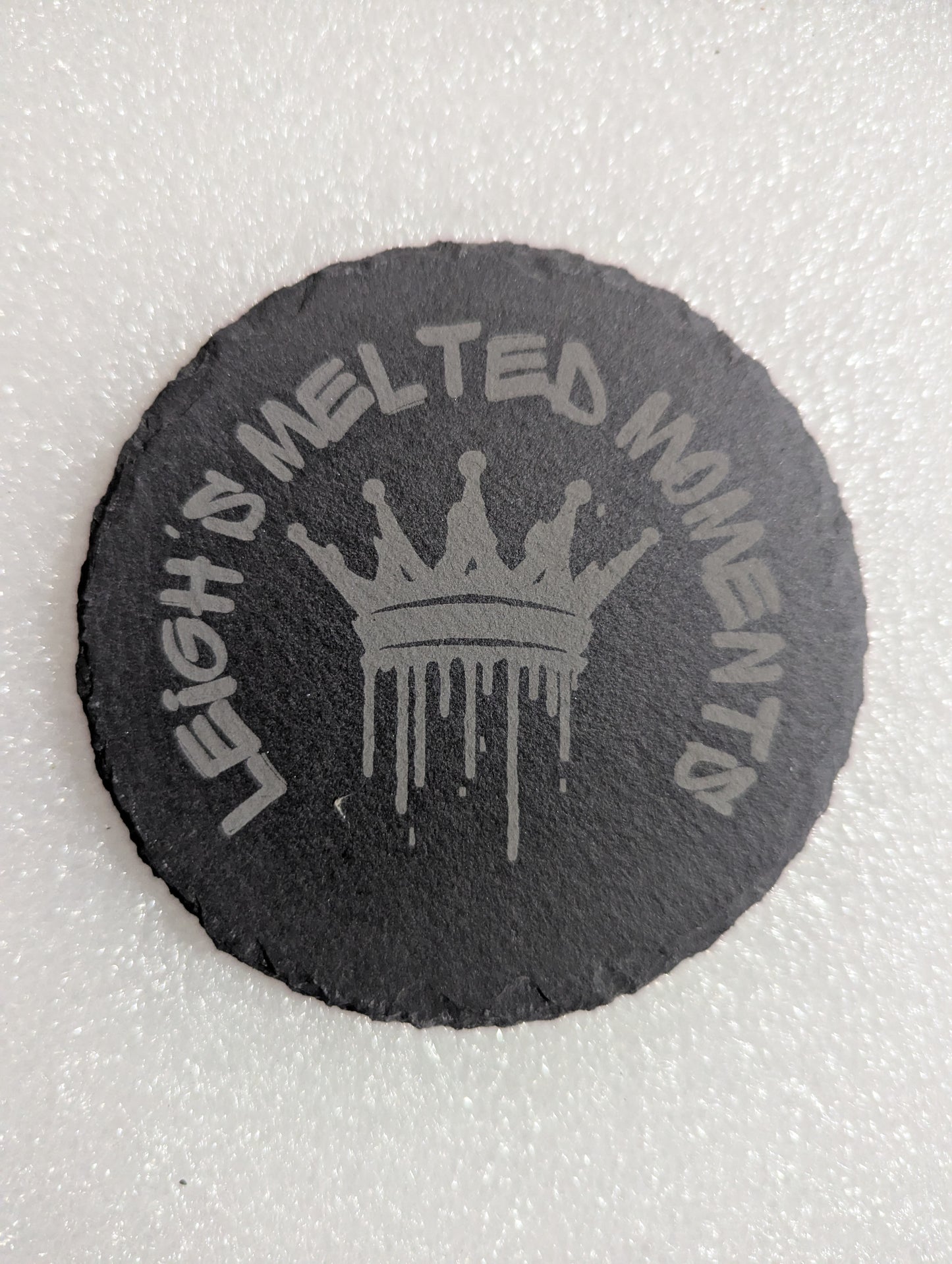 Slate coaster with an engraved dripping crown design and 'Leigh's Melted Moments' branding, offering a stylish and modern aesthetic.